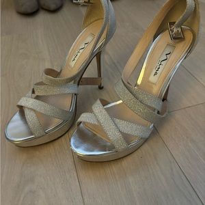 Silver platform heeled shoes worn once